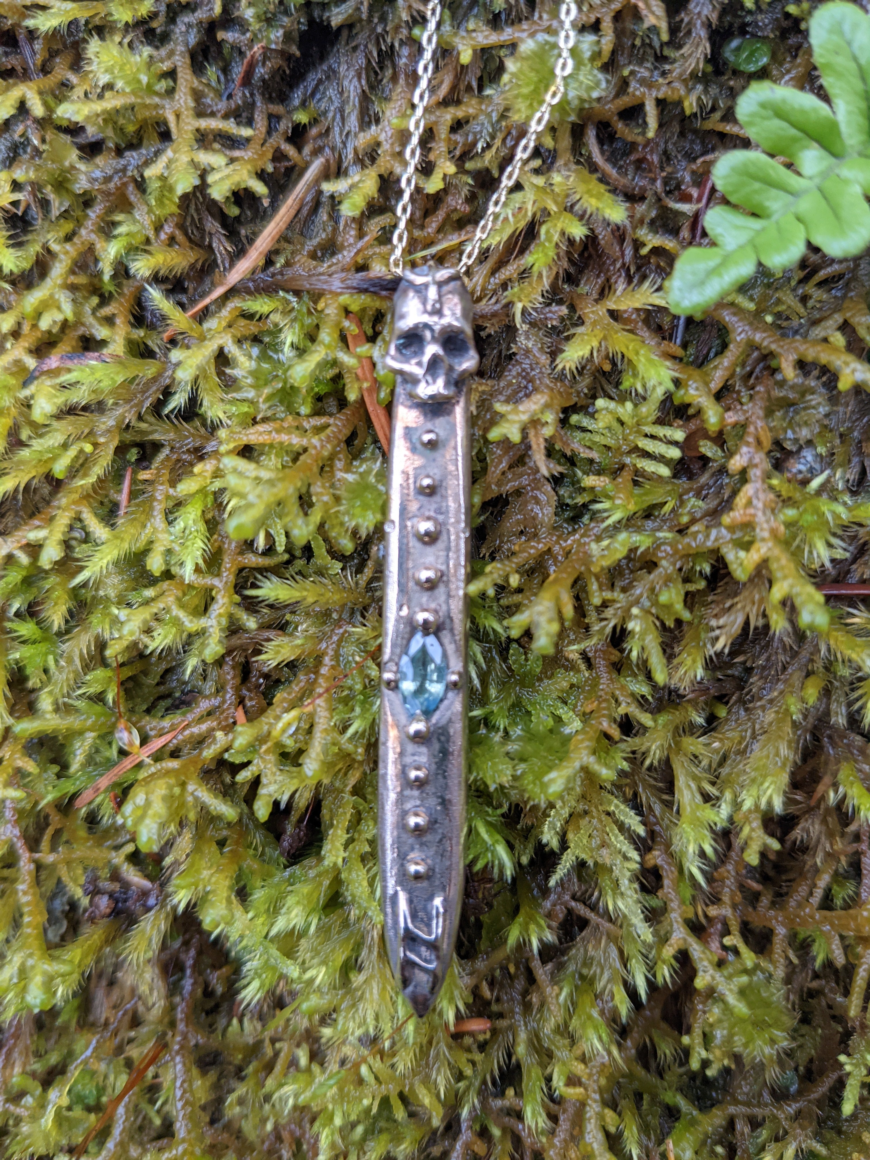 The Nail of Hel Necklace, Seafoam Sapphire and Bronze.