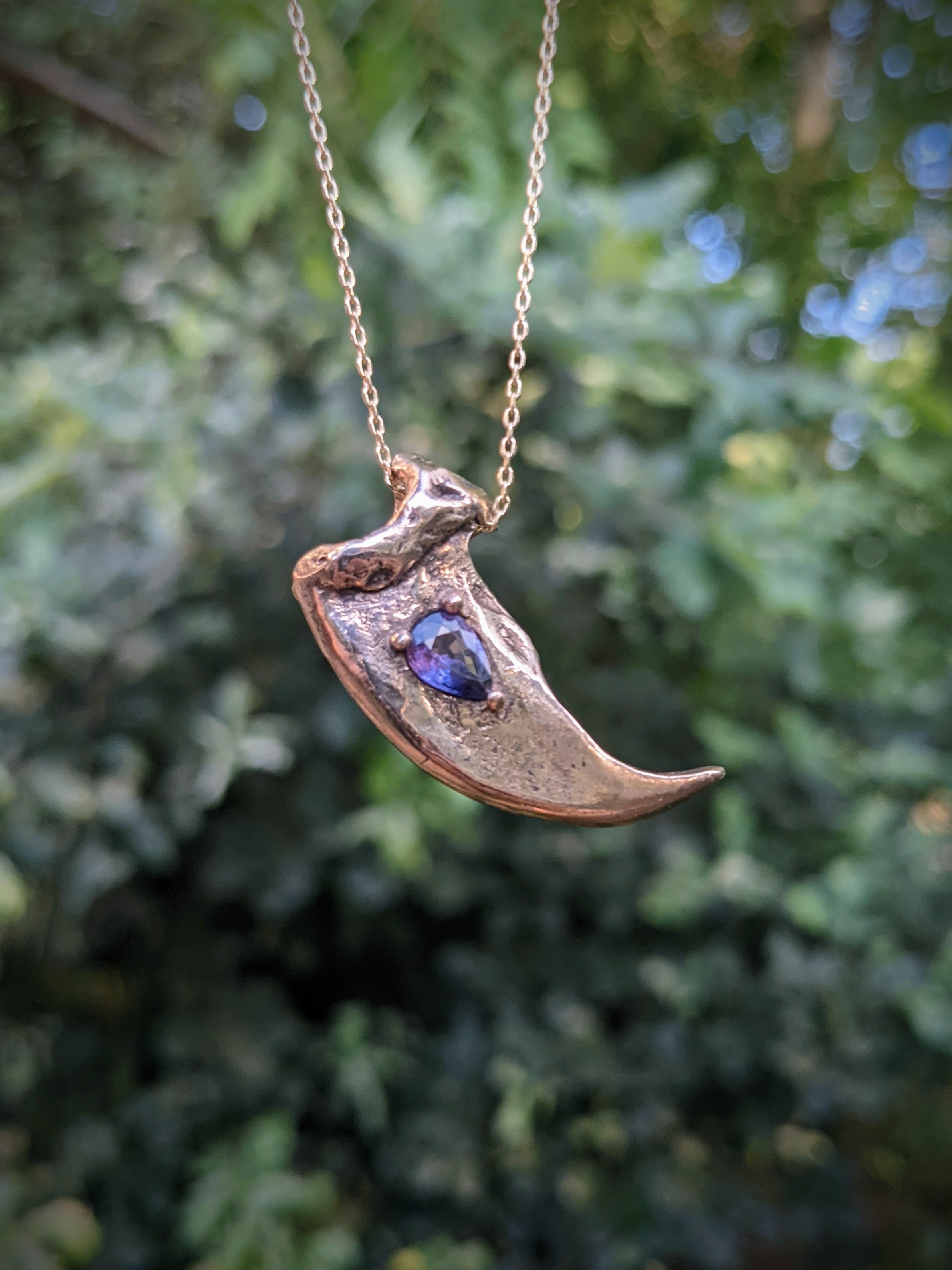 Kuma Yona necklace, Violet Sapphire and Bronze.