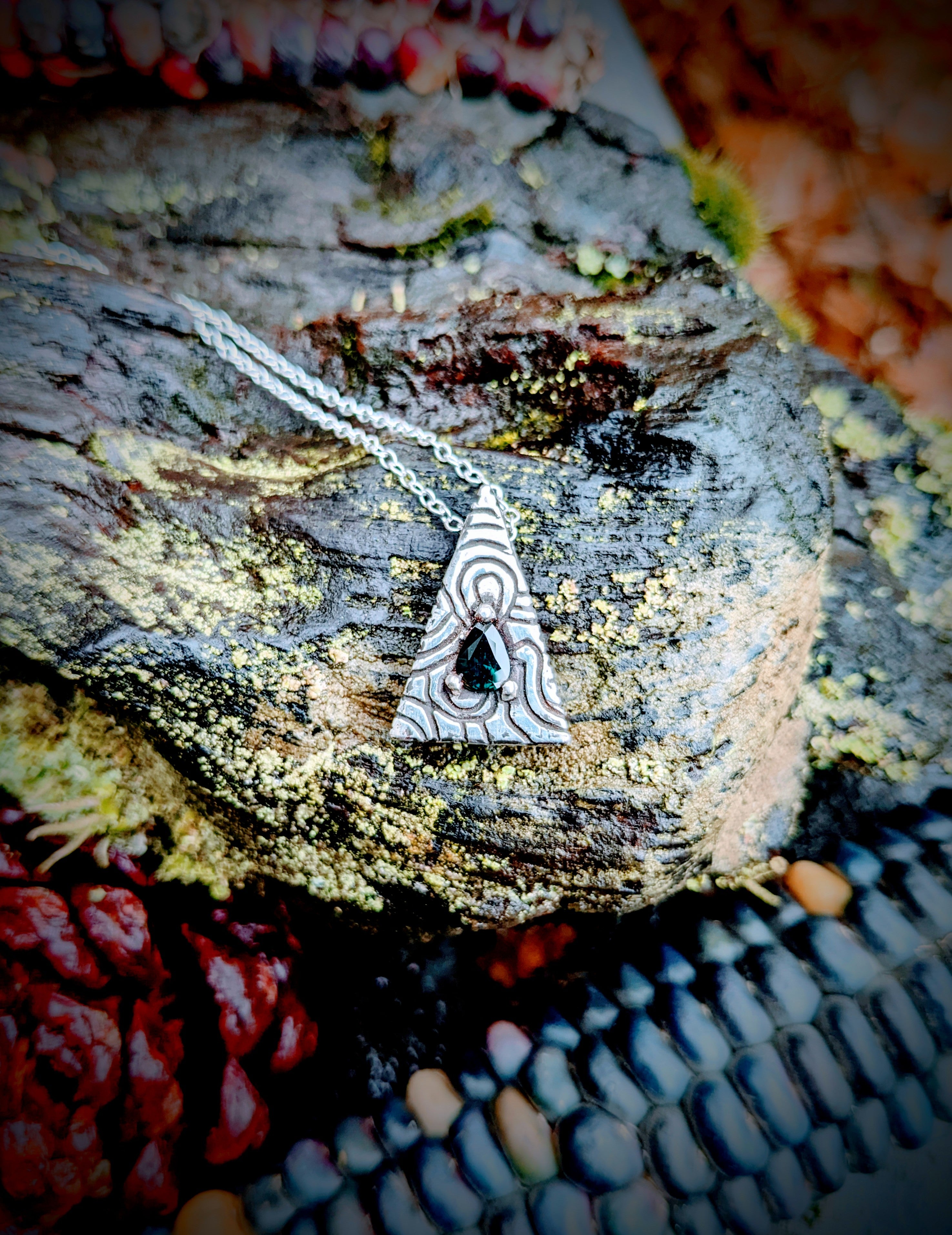 Pyramid of Flow, Sterling and Blue Sapphire.